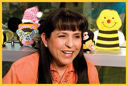 dr lopez cropped color photo of her happy with bees