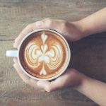 coffee latte hot in hands, weight loss and wellness solutions, san antonio texas